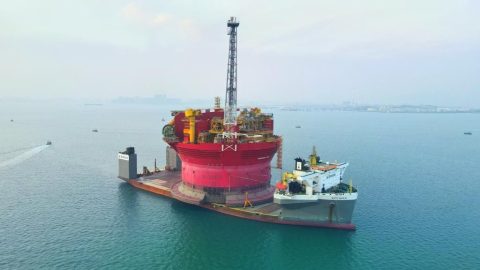Greenpeace takes action on Boskalis ship carrying Shell drilling platform